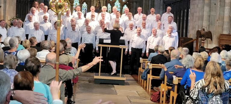 Singing Sweet Caroline with the audience.